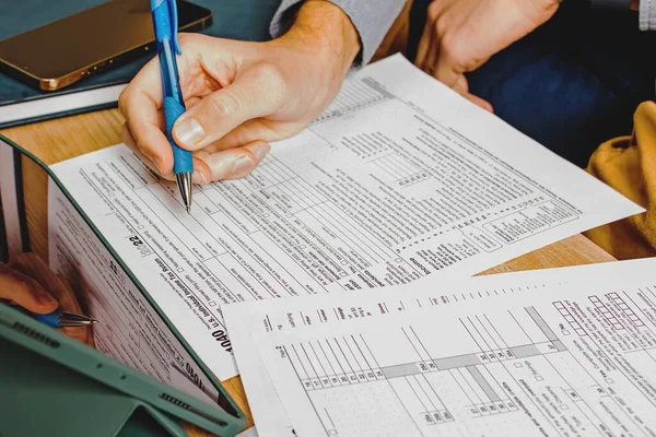 Close Man Hands Filling Individual Tax Forms Accounting Tax Season — 스톡 사진