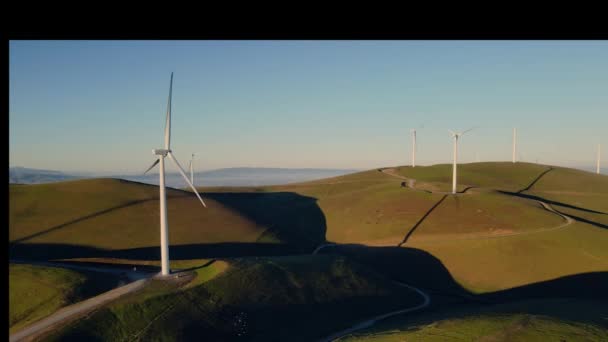 Aerial Drone View Wind Power Plant Green Hills Covered Grass — Video