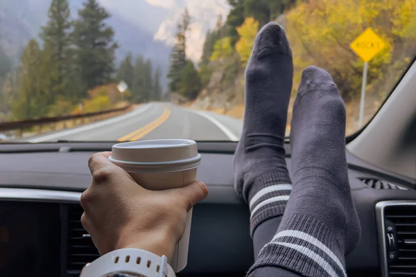 Woman Passenger Seat Holding Her Feet Cup Coffee Dash While — Stock Photo, Image
