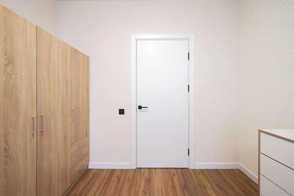 White interior door in the room interior