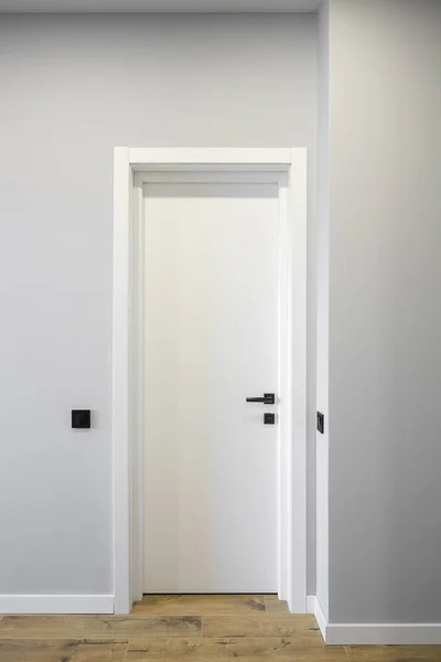 White interior door close-up in the room