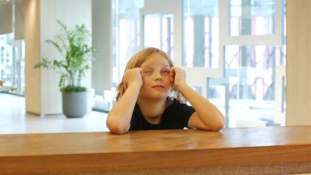 Tired Girl Eight Years Old Sits Table Props Her Head — Stock Video