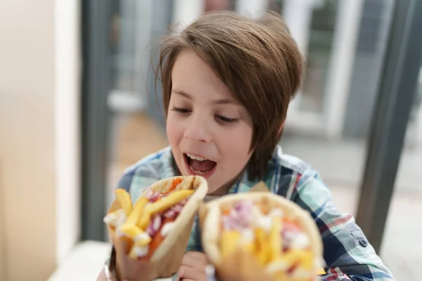 Handsome Elementary Age Boy Biting Pita Souvlaki Snack Greek Restaurant — Stock Photo, Image