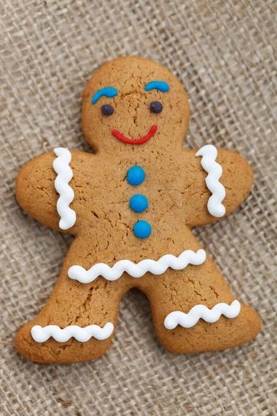 Gingerbread man cookie baked for holiday. Cute pastry item made at home
