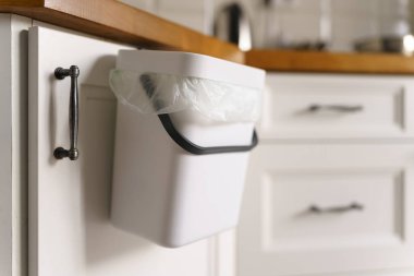 Compost bin in a domestic kitchen. Bokashi container for organic food waste. Recycle leftovers into natural fertilizer. Sustainable lifestyle and zero waste concept.  clipart