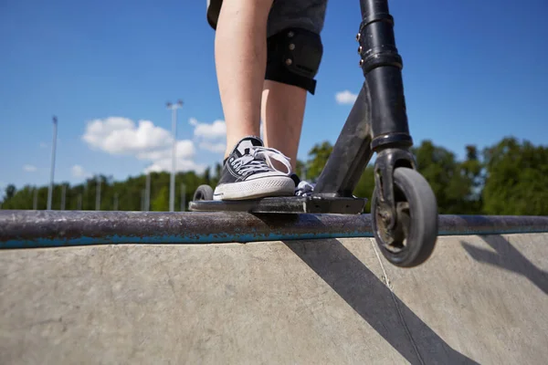 Young Boy Riding Kick Scooter Concrete Skatepark Unrecognizable Kid Standing — Stock Photo, Image