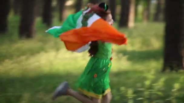 Cute Little Leprechaun Girl Running Forest Irish Flag Hands White — Video