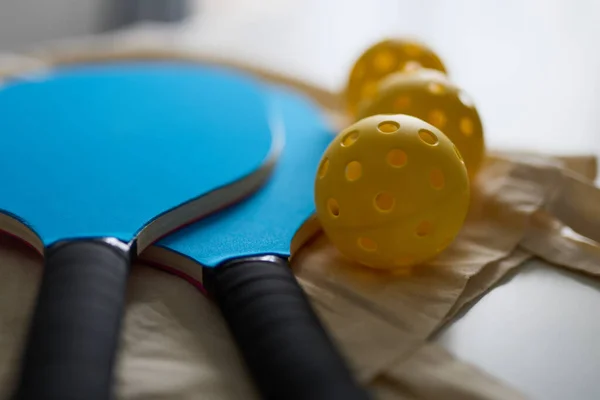 Stock image Set of balls and rackets for pickleball 