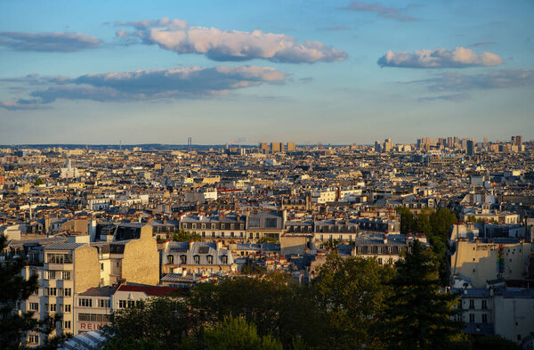 View on Paris at sunset photographed from Montmartre hill in spring. PARIS - 29 APRIL,2019