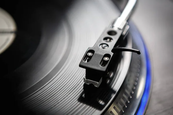 Listen to the music in hi fi quality. Turntables needle playing analog vinyl record with classic music