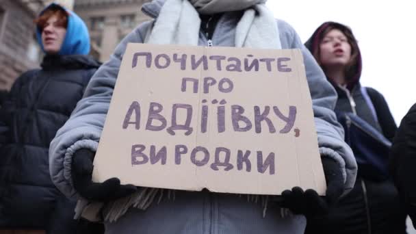 Demonstrator Holds Banner Read Avdiivka Freaks Demonstration Increase Military Budget — Stock Video