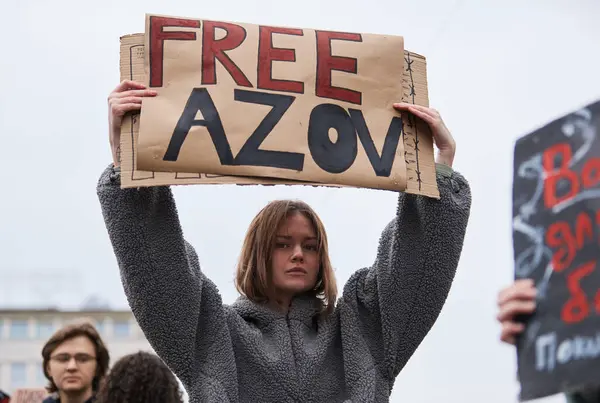 Stock image Activist from Ukraine posing with a banner 