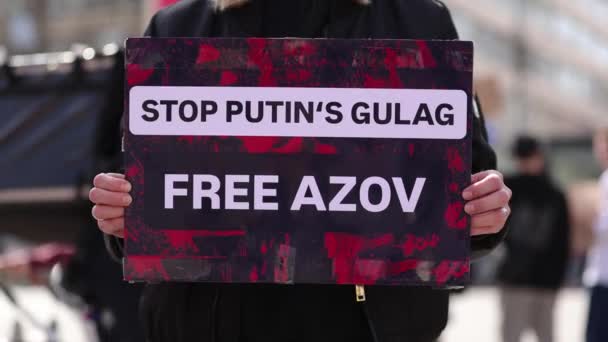 Person Holds Banner Stop Putin Gulag Free Azov Public Demonstration — Stock Video