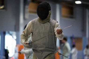 Profesyonel eskrimci Ukrayna Ulusal Eskrim Şampiyonası 'na hazırlanıyor. Kyiv - 30 Mart 2024