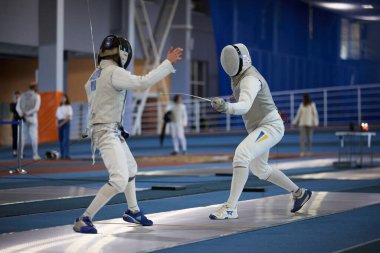 Ukrayna Ulusal Eskrim Şampiyonası 'nda profesyonel eskrimciler ödül için mücadele ediyor. Kyiv - 30 Mart 2024