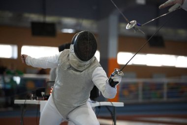 Ukraynalı eskrimci Ukrayna Ulusal Eskrim Şampiyonası 'nda nöbette. Kyiv - 30 Mart 2024