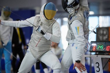 Ukraynalı eskrimciler, Milli Eskrim Takımı üyeleri, Ukrayna Şampiyonası 'nda yakın dövüş. Kyiv - 30 Mart 2024
