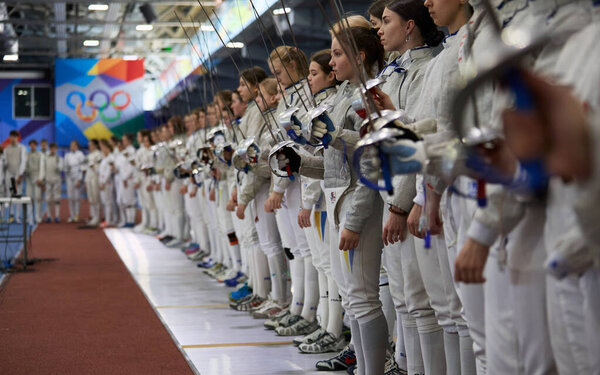 Ukrainian fencers salute with swords at the opening ceremony of the National Fencing Championship of Ukraine. Kyiv - 30 March,2024