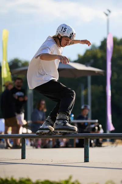 stock image Toupsoul grind on rail. Aggressive in-line roller skating on contest in skatepark. Kyiv - 4 August,2024