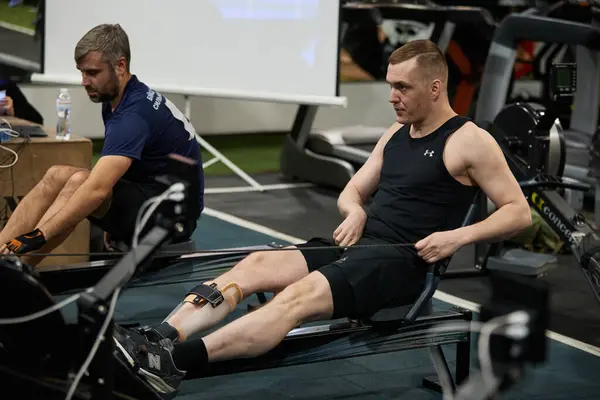 stock image Injured Ukrainian veteran compete at rowing contest during Air Force Trials. Kyiv - 13 December,2023