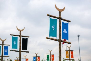 Flags of islamic tribes at Etnospor Kultur Festivali. Istanbul - 11 May,2018 clipart