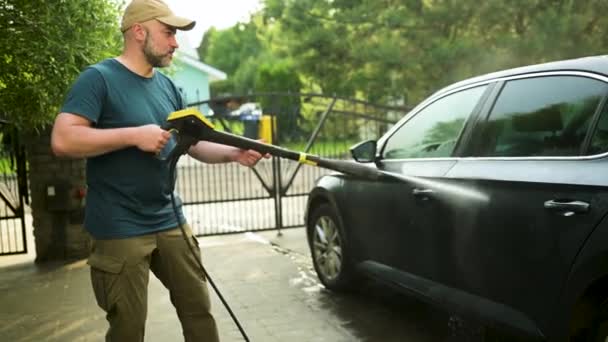 Young Man Using Water Gun Wash His Car Male Driver — Αρχείο Βίντεο
