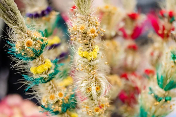 Traditional Lithuanian Easter palms known as verbos sold on Kaziukas, Easter market in Vilnius. Lithuanian capitals annual traditional crafts fair is held every March on Old Town streets.
