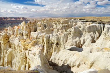 Stunning view of white striped sandstone hoodoos in Coal Mine Canyon near Tuba city, Arizona, USA. Exploring the American Southwest.