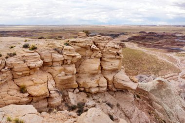 Striped purple sandstone formations of Blue Mesa badlands in Petrified Forest National Park, Arizona, USA. Exploring the American Southwest.