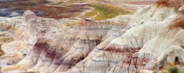 Striped purple sandstone formations of Blue Mesa badlands in Petrified Forest National Park, Arizona, USA. Exploring the American Southwest.