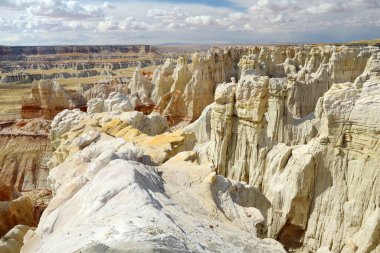 Stunning view of white striped sandstone hoodoos in Coal Mine Canyon near Tuba city, Arizona, USA. Exploring the American Southwest.