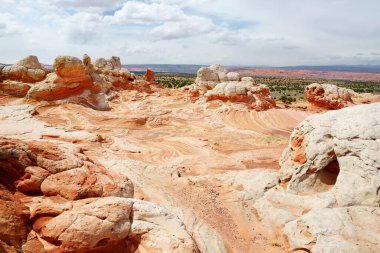 Mindblowing shapes and colors of moonlike sandstone formations in White Pocket, Arizona, USA. Exploring the American Southwest.