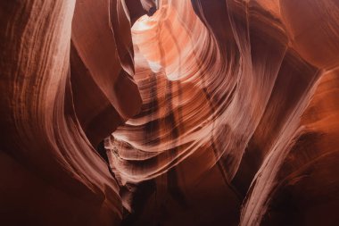 Glowing colors of Upper Antelope Canyon, the famous slot canyon in Navajo reservation near Page, Arizona, USA. Exploring the American Southwest.