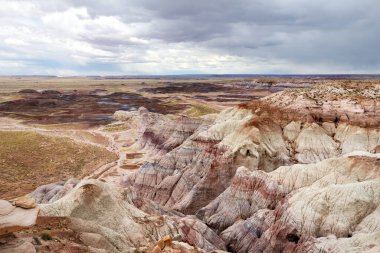 Striped purple sandstone formations of Blue Mesa badlands in Petrified Forest National Park, Arizona, USA. Exploring the American Southwest.