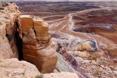 Striped purple sandstone formations of Blue Mesa badlands in Petrified Forest National Park, Arizona, USA. Exploring the American Southwest.