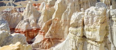 Stunning view of white striped sandstone hoodoos in Coal Mine Canyon near Tuba city, Arizona, USA. Exploring the American Southwest.