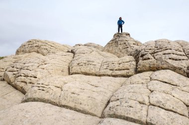 Amazing shapes and colors of moonlike sandstone formations in White Pocket, Arizona, USA. Exploring the American Southwest.