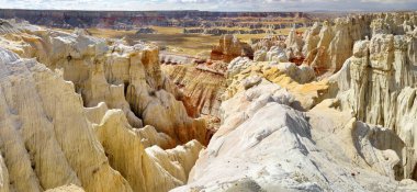 Stunning view of white striped sandstone hoodoos in Coal Mine Canyon near Tuba city, Arizona, USA. Exploring the American Southwest.