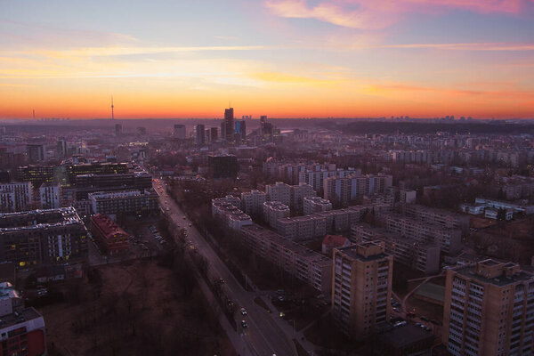 Beautiful Vilnius city panorama in winter. Aerial sunrise view. Winter city scenery in Vilnius, Lithuania.
