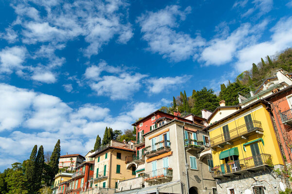 Typical colorful houses in Varenna, one of the most picturesque towns on the shore of Lake Como. Charming location with typical Italian atmosphere. Varenna, Lombardy, Italy.