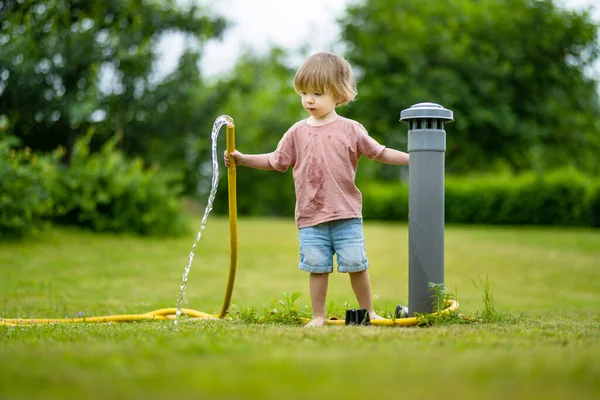 Cute Toddler Boy Watering Flower Beds Garden Summer Day Child — 图库照片