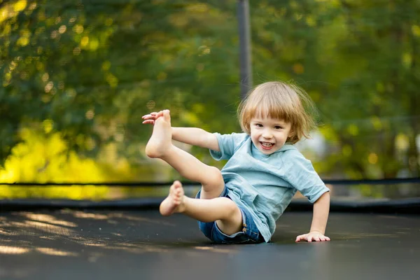 Cute Toddler Boy Jumping Trampoline Backyard Warm Sunny Summer Day — Stock Photo, Image