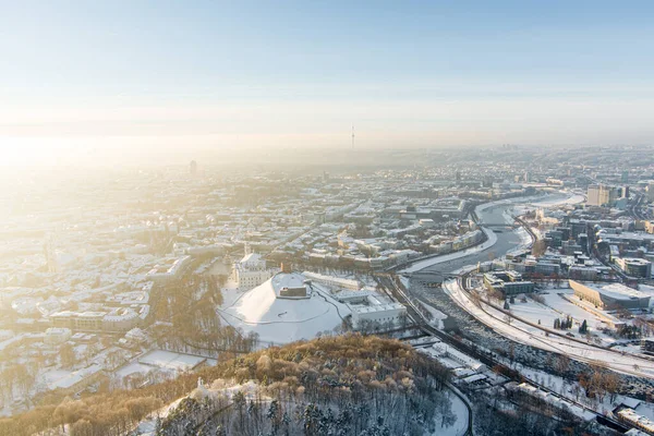 Beautiful sunny Vilnius city scene in winter. Aerial early evening view. Winter city scenery in Vilnius, Lithuania.