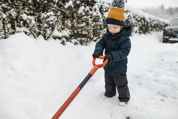 Adorable Toddler Boy Helping His Grandfather Shovel Snow Backyard Winter — Stock Photo, Image