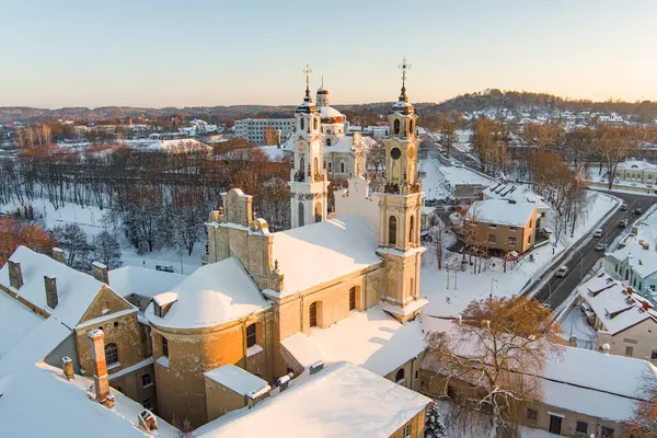 Aerial night view of church of the Ascension of the Lord in Vilnius, Lithuania. Beautiful sunny Vilnius city scene in winter. Winter city scenery in Lithuania.