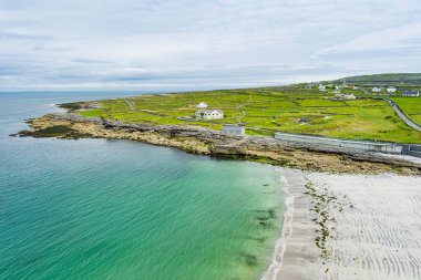 Aerial view of the wide sandy Kilmurvey Beach on Inishmore, the largest of the Aran Islands in Galway Bay, Ireland.
