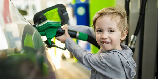 Cute Little Blond Boy Holding Pump Nozzle Small Funny Kid — Stock Photo, Image