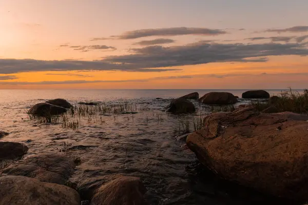 stock image Rocks and boulders on a beach of Altja, a typical seaside fishing village on a shore of Gulf of Finland, Lahemaa National Park, northern Estonia.