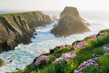 Scheildren, most iconic and photographed landscape at Malin Head, Ireland's northernmost point, Wild Atlantic Way, spectacular coastal route. Wonders of nature. Numerous Discovery Points. Co. Donegal clipart