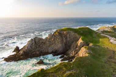 Scheildren, most iconic and photographed landscape at Malin Head, Ireland's northernmost point, Wild Atlantic Way, spectacular coastal route. Wonders of nature. Numerous Discovery Points. Co. Donegal clipart